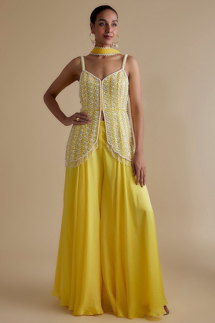 Yellow Georgette Embroidered Tunic Set by Keith Gomes
