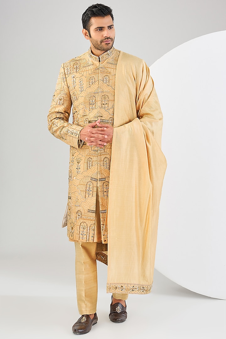 Gold Raw Silk Hand Embroidered Sherwani Set by Kudrat Couture