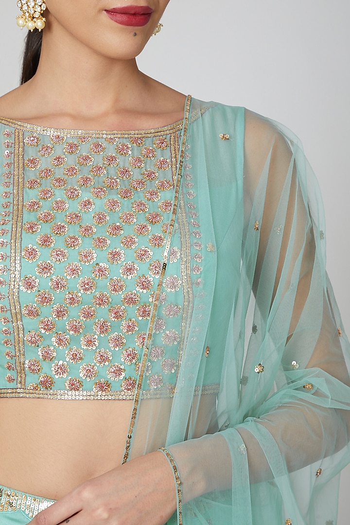 Turquoise Embroidered Wedding Lehenga Set by Kudi Pataka Designs at Pernia's Pop Up Shop