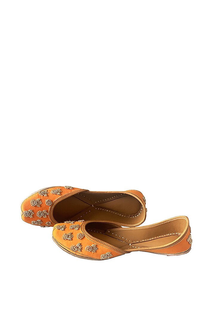 Orange Leather Floral Embroidered Juttis by Kurrbat