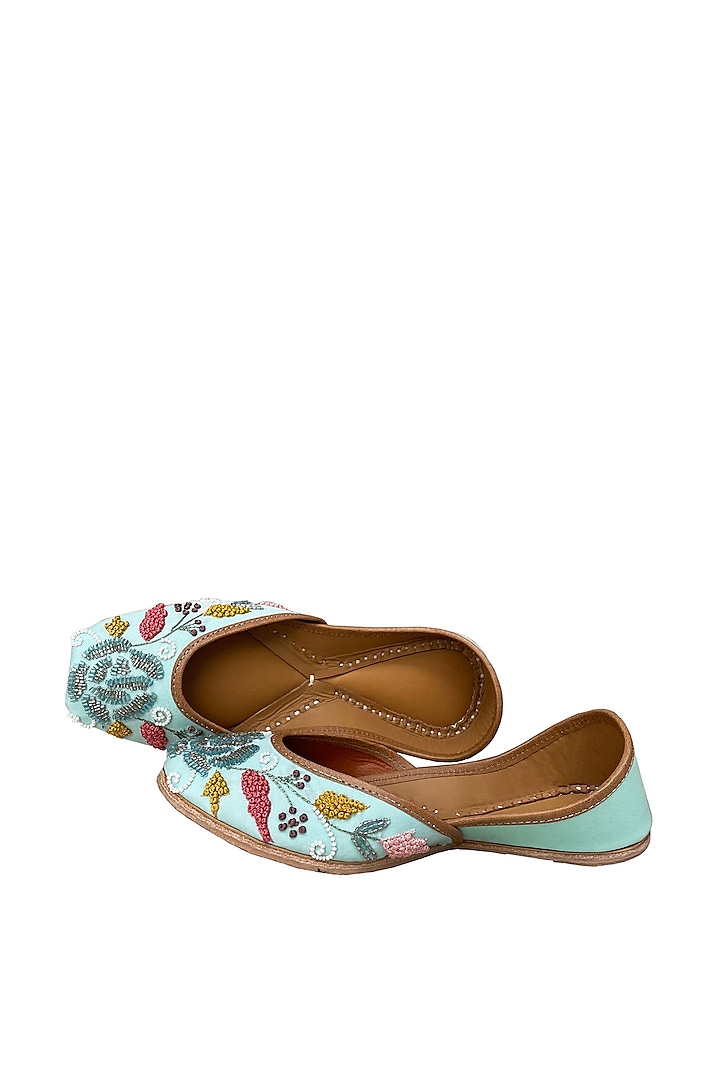 Turquoise Leather Embroidered Juttis by Kurrbat
