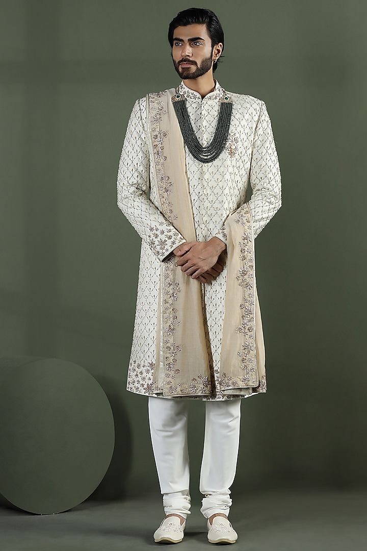 Ivory Raw Silk Hand Embroidered Sherwani Set by Kushal's Men