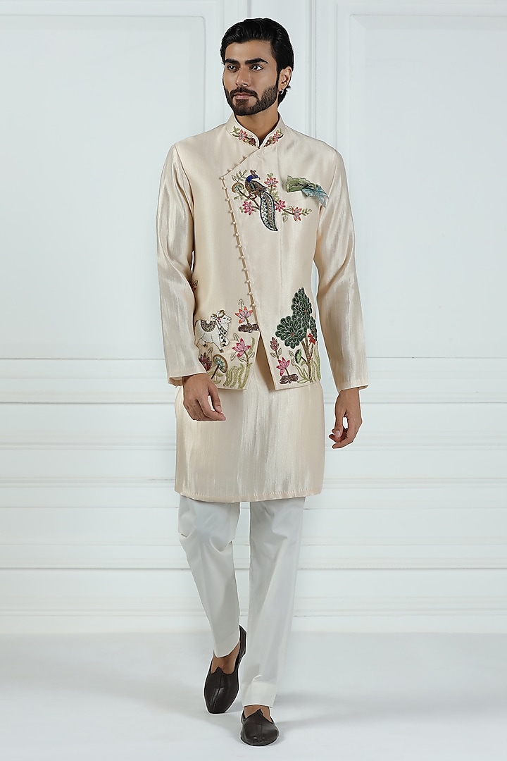 Beige Shimmer Silk Hand Embroidered Asymmetric Nehru Jacket Set by Kushal's Men at Pernia's Pop Up Shop