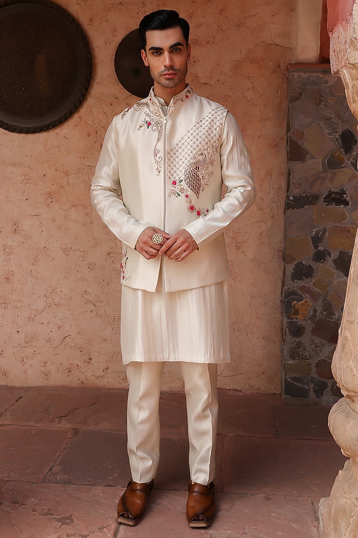 Ivory Shimmer Silk Peacock Motif Bundi Set by Kushal's Men at Pernia's Pop Up Shop