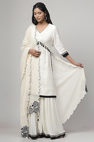 Porcelain White Georgette Applique Embroidered Gharara Set by Kushani