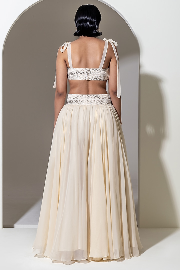 Ivory Organza Sequins Hand Embellished Bralette by KUSMI at Pernia's Pop Up Shop