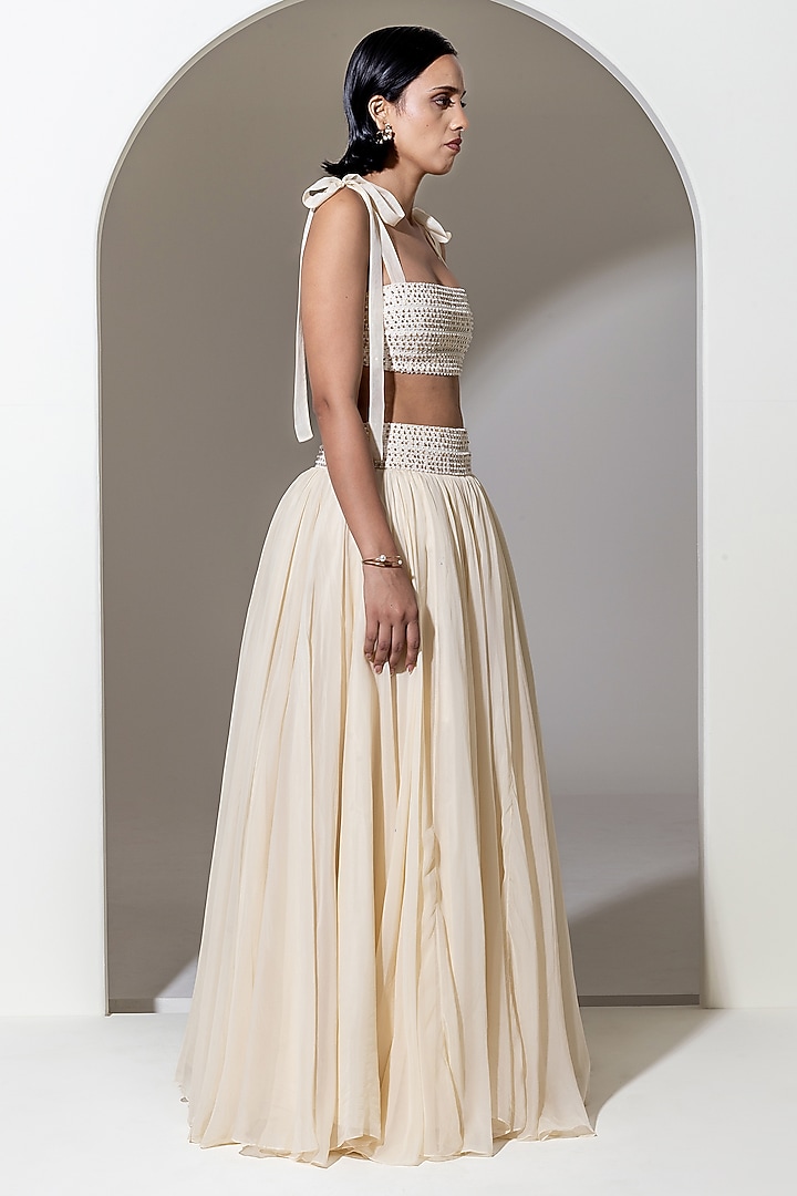 Ivory Organza Sequins Hand Embellished Bralette by KUSMI at Pernia's Pop Up Shop