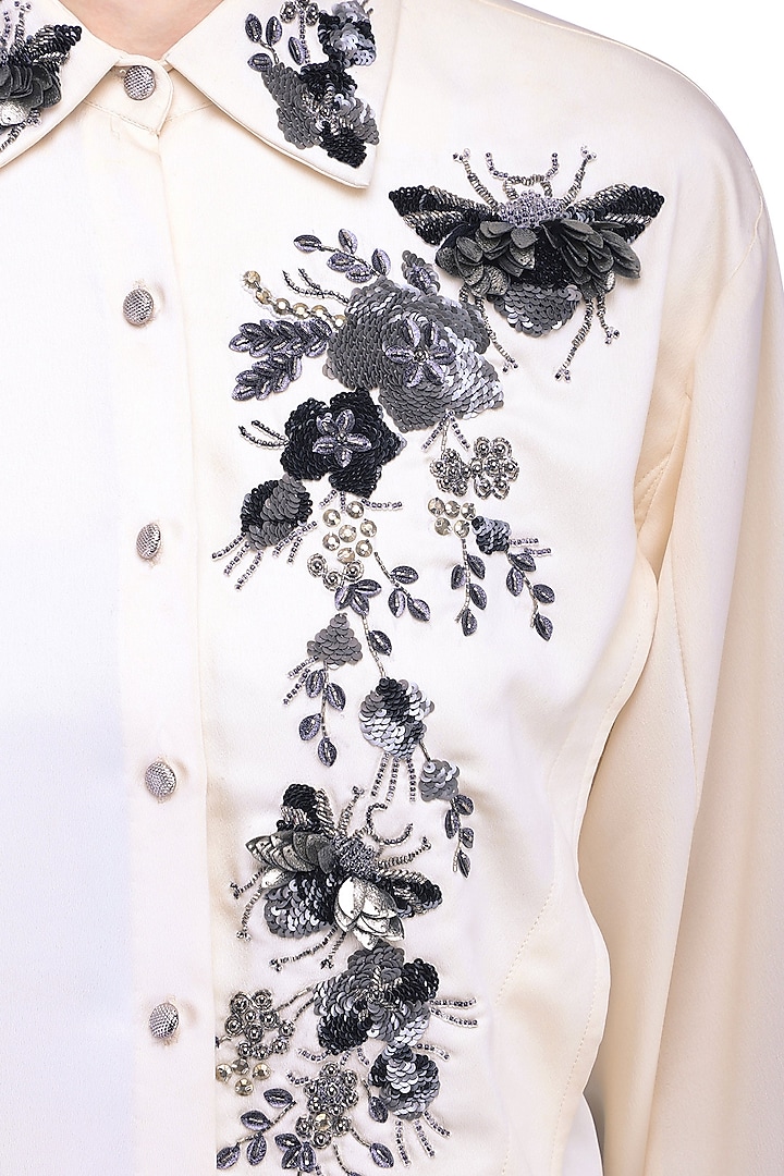 Ivory asymmetrical shirt available only at Pernia's Pop Up Shop.
