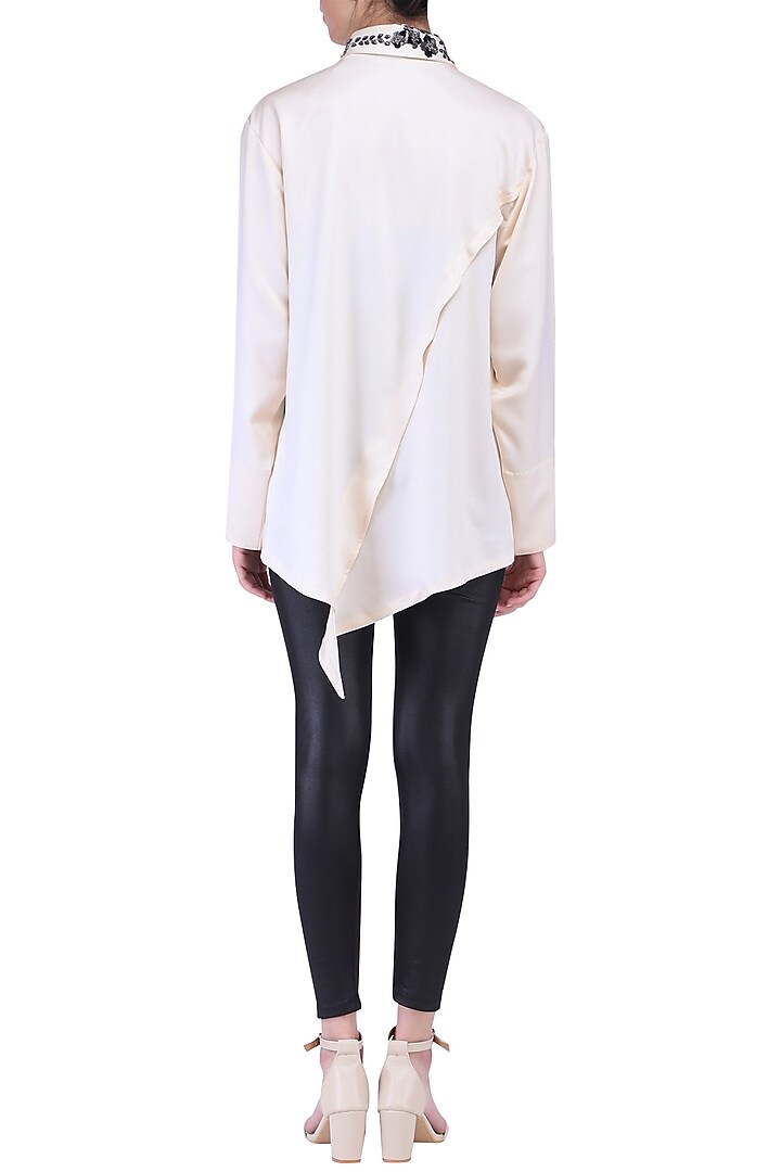 Ivory asymmetrical shirt available only at Pernia's Pop Up Shop.