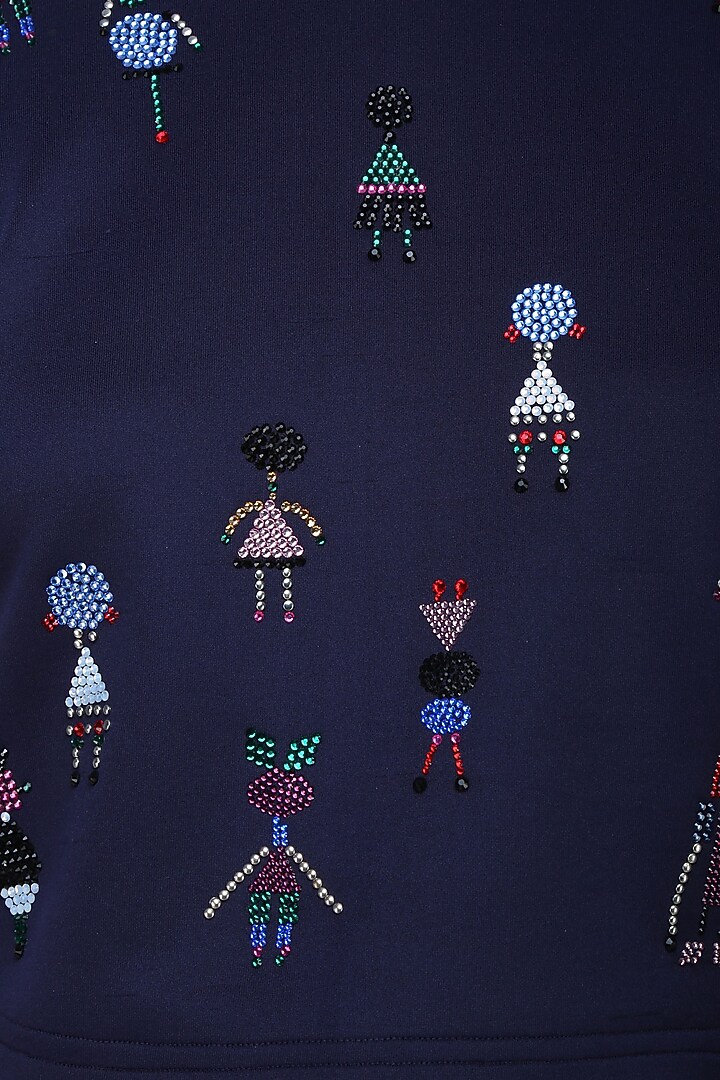 Blue beads and crystal embellished motifs top available only at Pernia's Pop Up Shop.