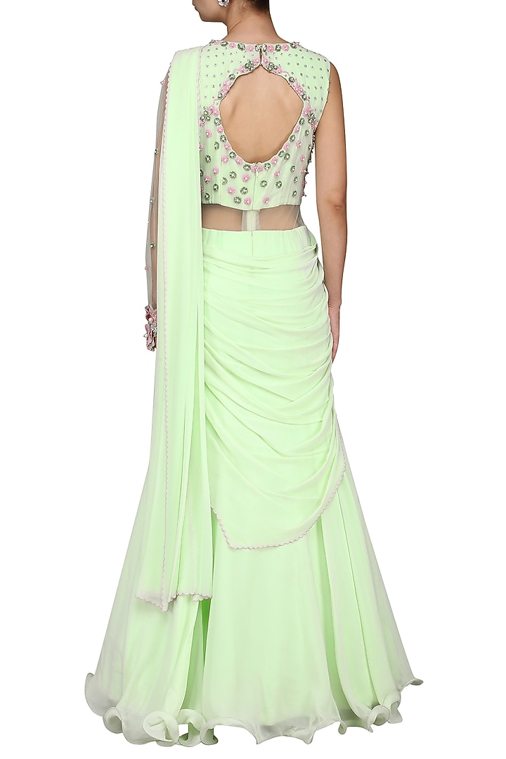 Green embroidered saree gown available only at Pernia's Pop Up Shop.