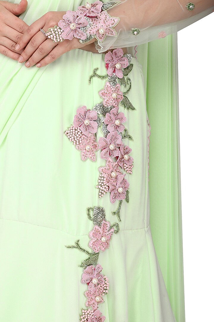 Green embroidered saree gown available only at Pernia's Pop Up Shop.