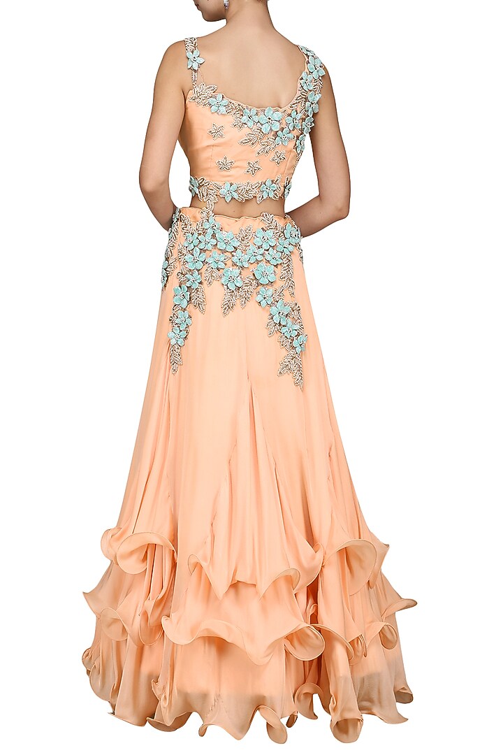 Peach layered lehenga set available only at Pernia's Pop Up Shop.