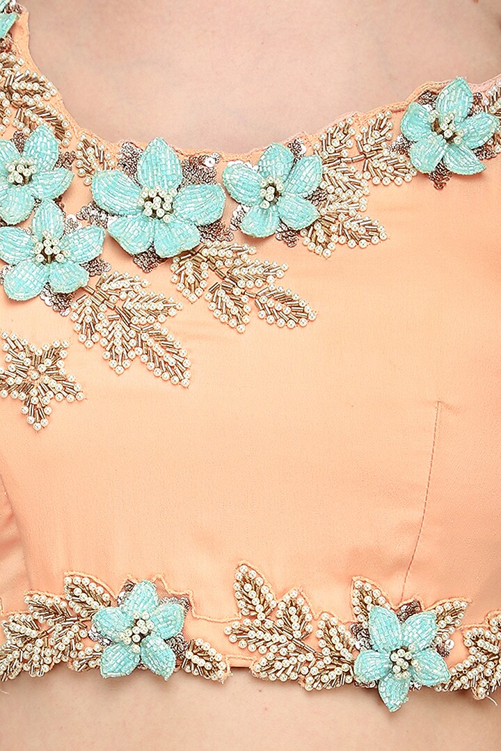 Peach layered lehenga set available only at Pernia's Pop Up Shop.