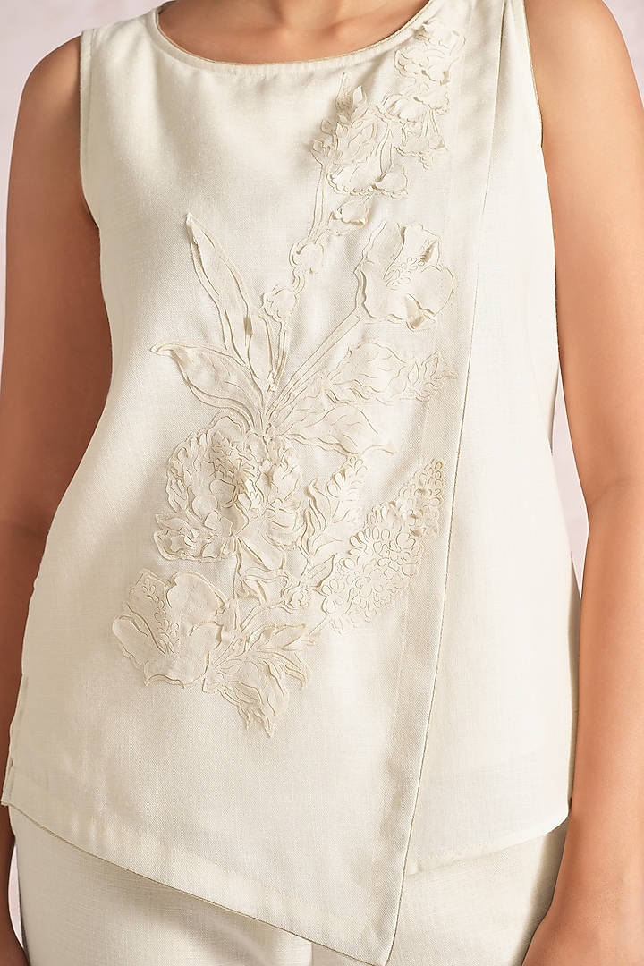 Off-White Linen Blend Floral Top by Kaveri at Pernia's Pop Up Shop