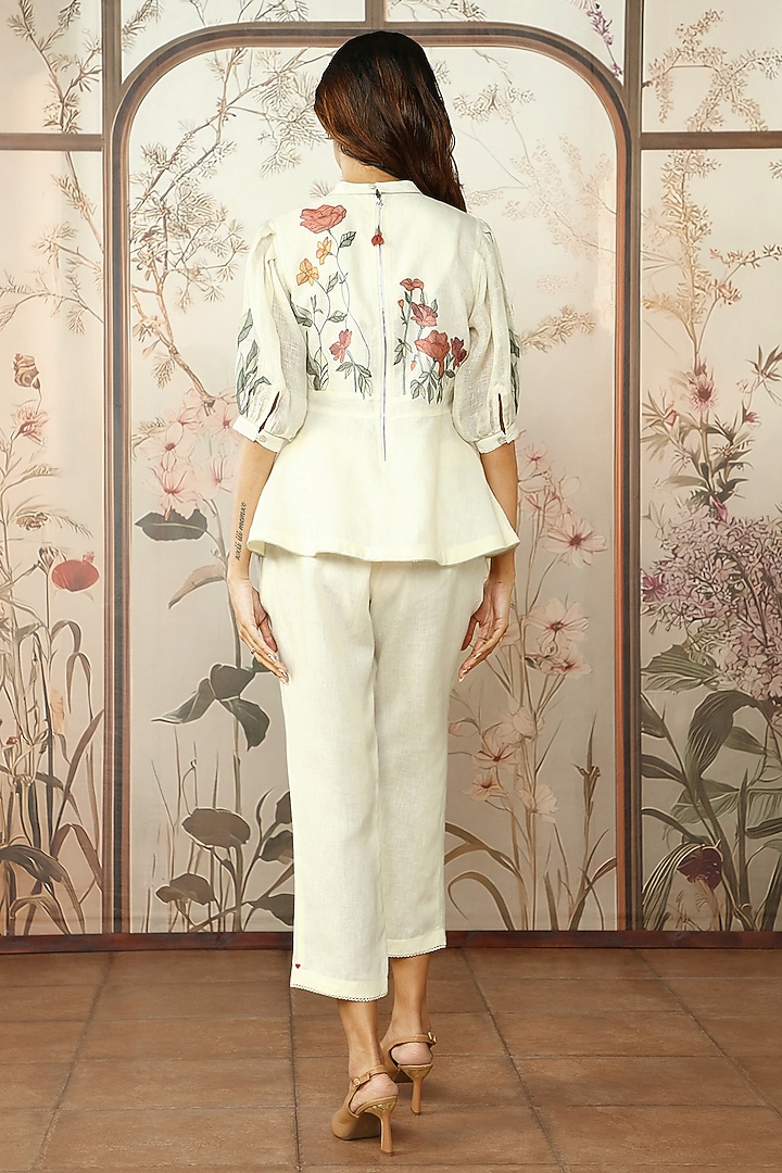 Off-White Linen Embroidered Peplum Top by Kaveri at Pernia's Pop Up Shop