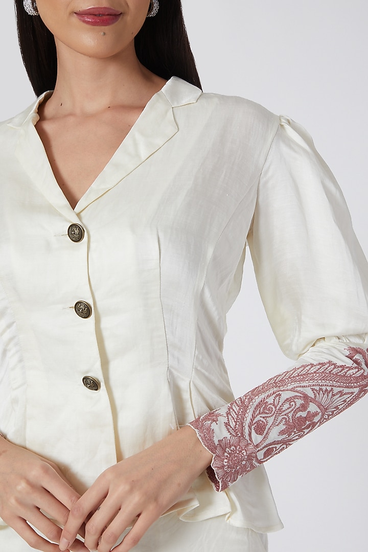 Ivory & Dusty Rose Pink Peplum Blouse With Thread Work by Kartikeya at Pernia's Pop Up Shop