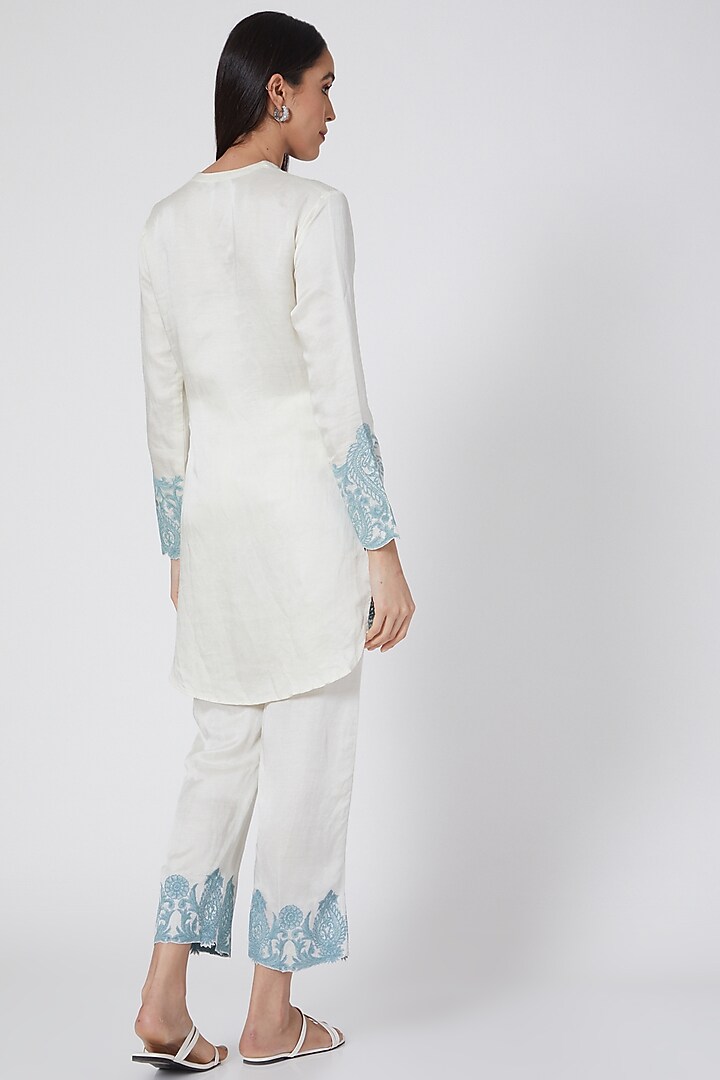Ivory & Turquoise Kurta Set With Thread Work by Kartikeya at Pernia's Pop Up Shop