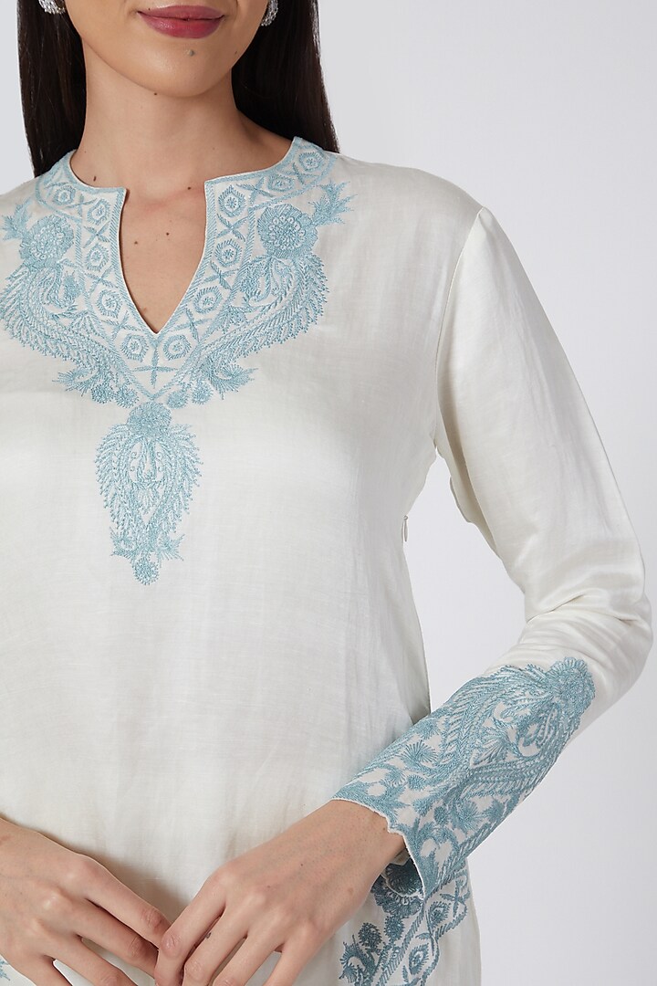 Ivory & Turquoise Kurta Set With Thread Work by Kartikeya at Pernia's Pop Up Shop