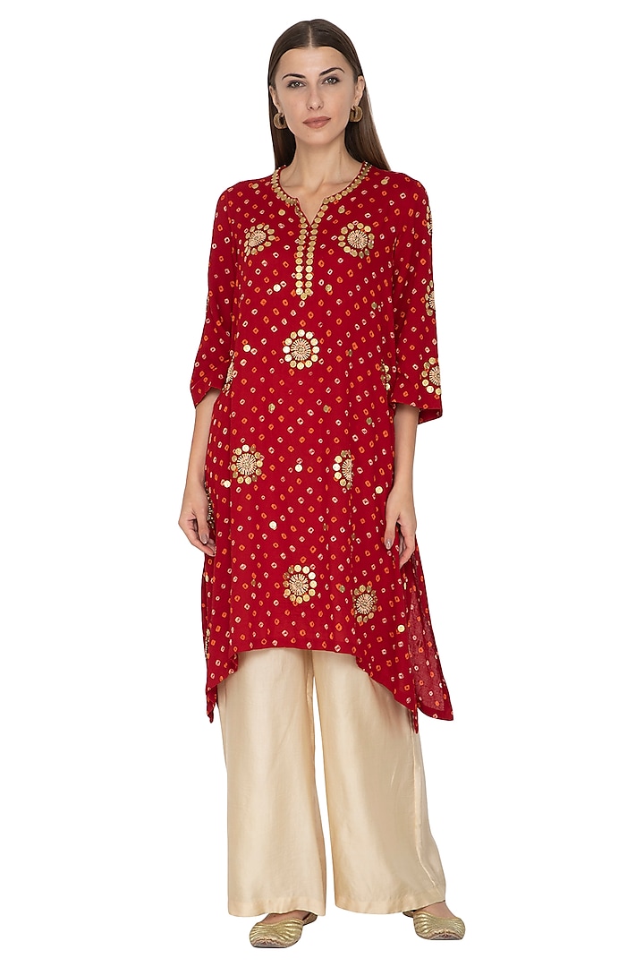 Red Embroidered Dip-Hem Bandhani Kurta With Beige Gold Pants by Kunza