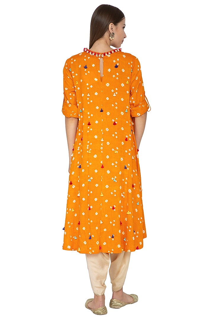 Mango Yellow Embroidered Asymmetric Tunic With Gold Dhoti Pants by Kunza at Pernia's Pop Up Shop