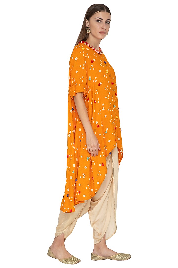 Mango Yellow Embroidered Asymmetric Tunic With Gold Dhoti Pants by Kunza at Pernia's Pop Up Shop