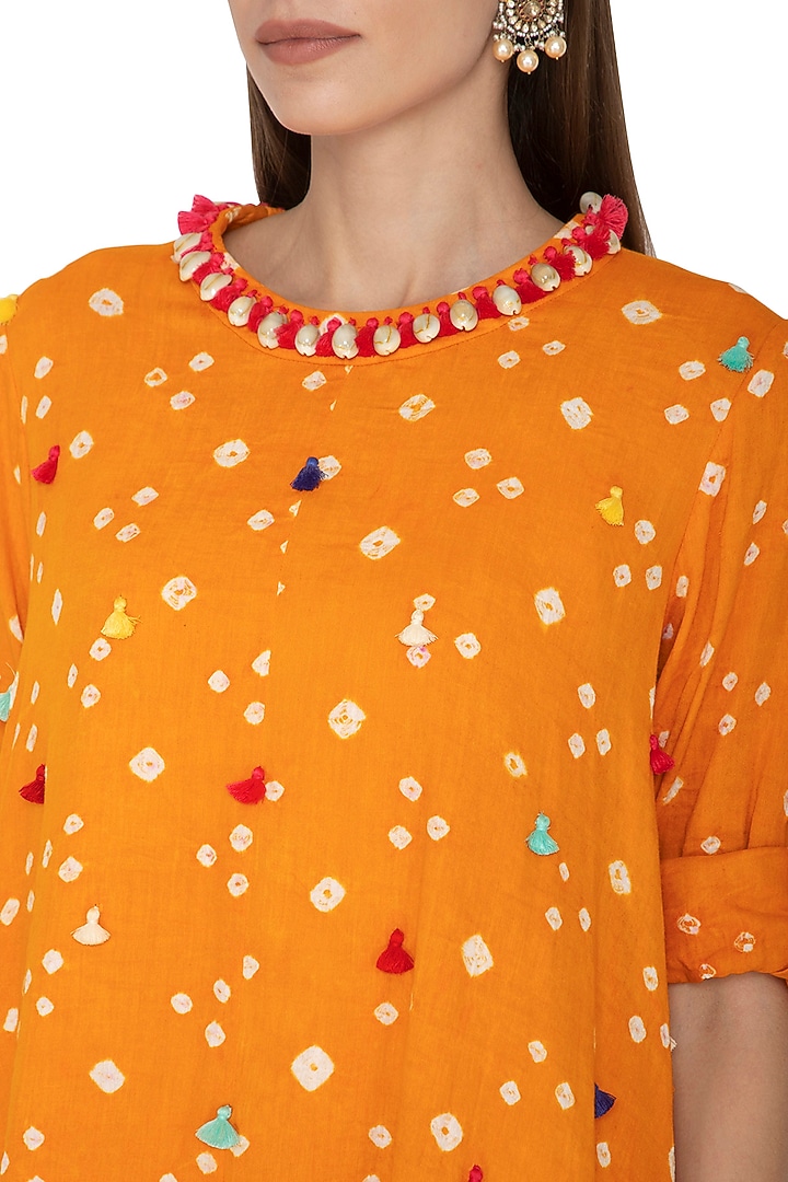 Mango Yellow Embroidered Asymmetric Tunic With Gold Dhoti Pants by Kunza at Pernia's Pop Up Shop