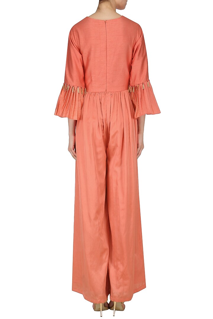 Carrot red embroidered jumpsuit available only at Pernia's Pop Up Shop.