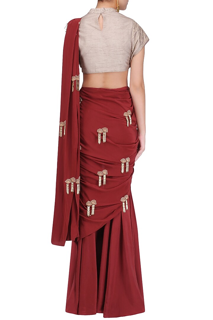 Red and gold embroidered pre stitched sharara saree available only at Pernia's Pop Up Shop.