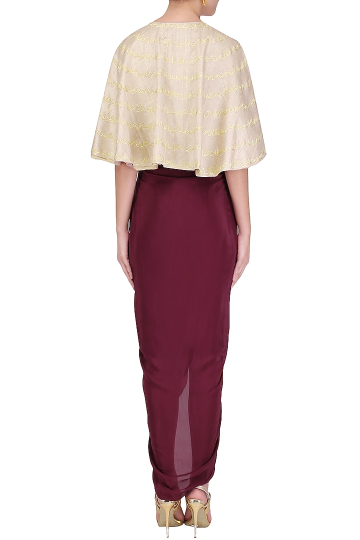 Oxblood dhoti and bustier with beige cape available only at Pernia's Pop Up Shop.