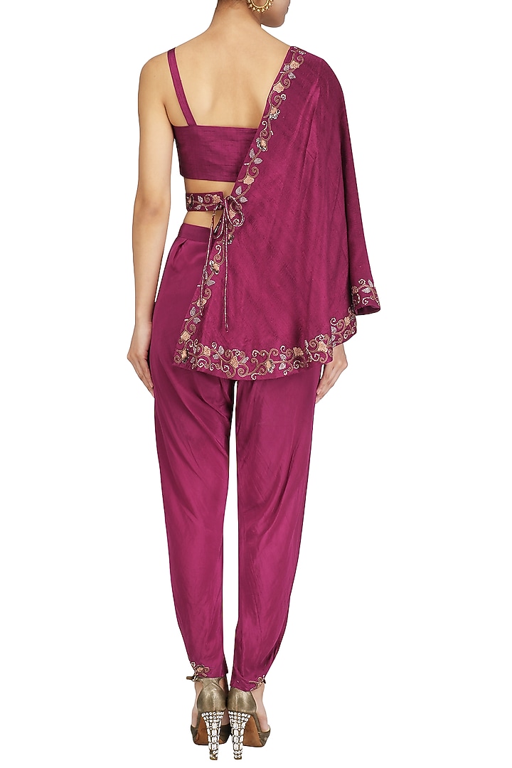 Maroon embroidered dhoti and bustier with one-shoulder cape available only at Pernia's Pop Up Shop.