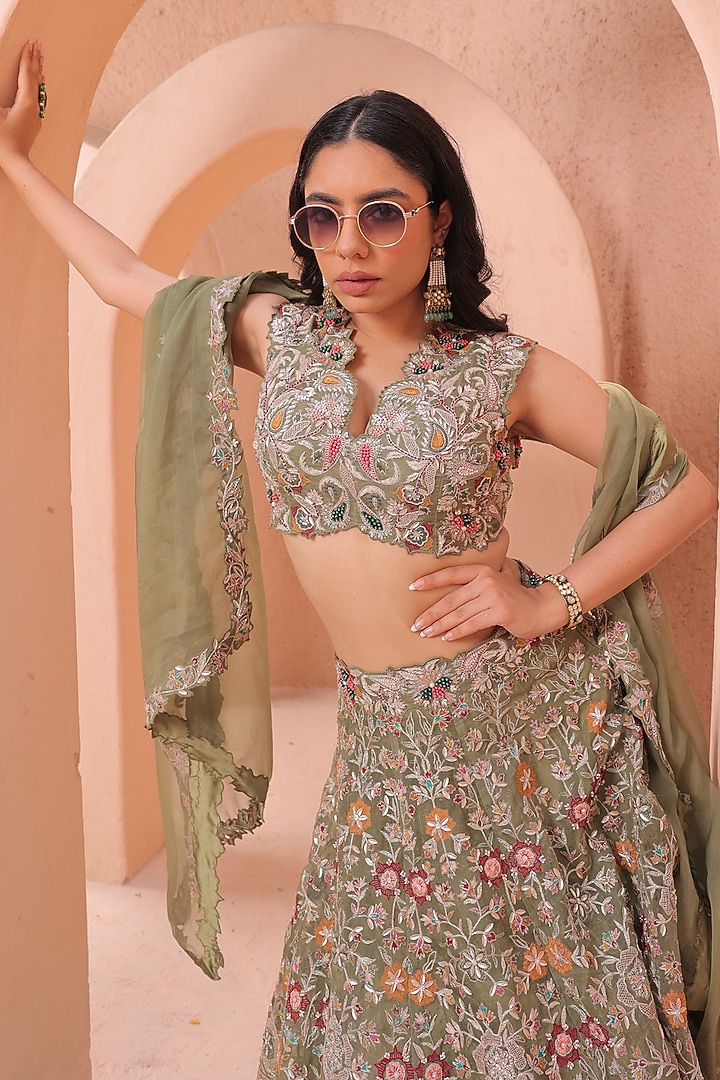 Olive Green Organza Hand Embellished Bridal Lehenga Set by Label Astha Chhabra at Pernia's Pop Up Shop