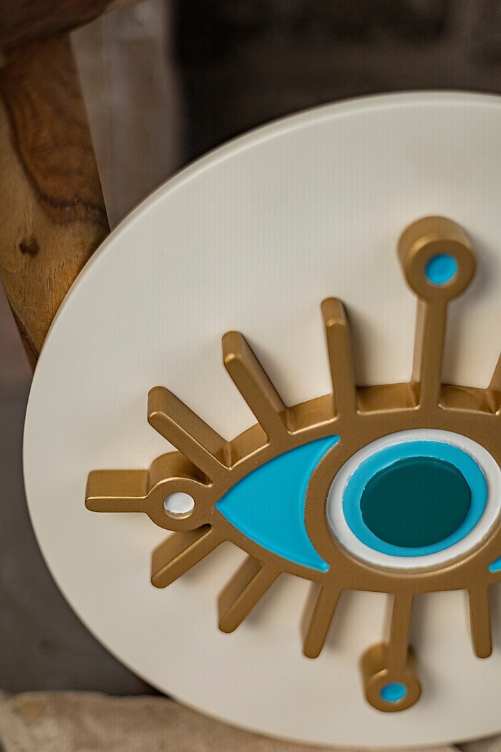 White & Gold Engineered Wood Nazar Battu Wall Art by La Dimora Selections at Pernia's Pop Up Shop