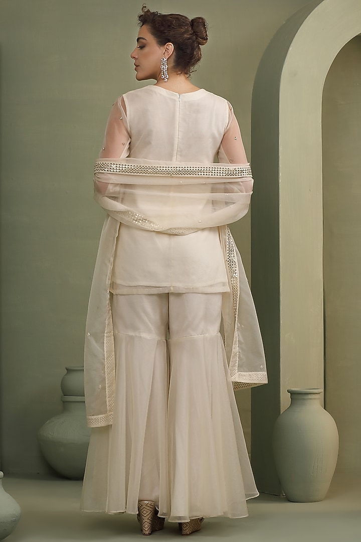 Ivory Organza Party Wear Sharara Set by Label Kaleido at Pernia's Pop Up Shop