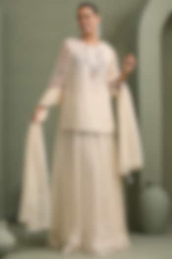 Ivory Viscose Organza Lehenga Set by Label Kaleido at Pernia's Pop Up Shop