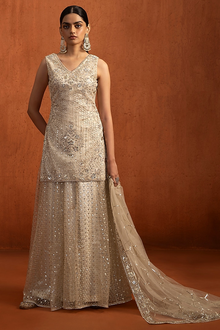 Ivory Net Sequins Embroidered Party Wear Sharara Set by Lashkaraa at Pernia's Pop Up Shop