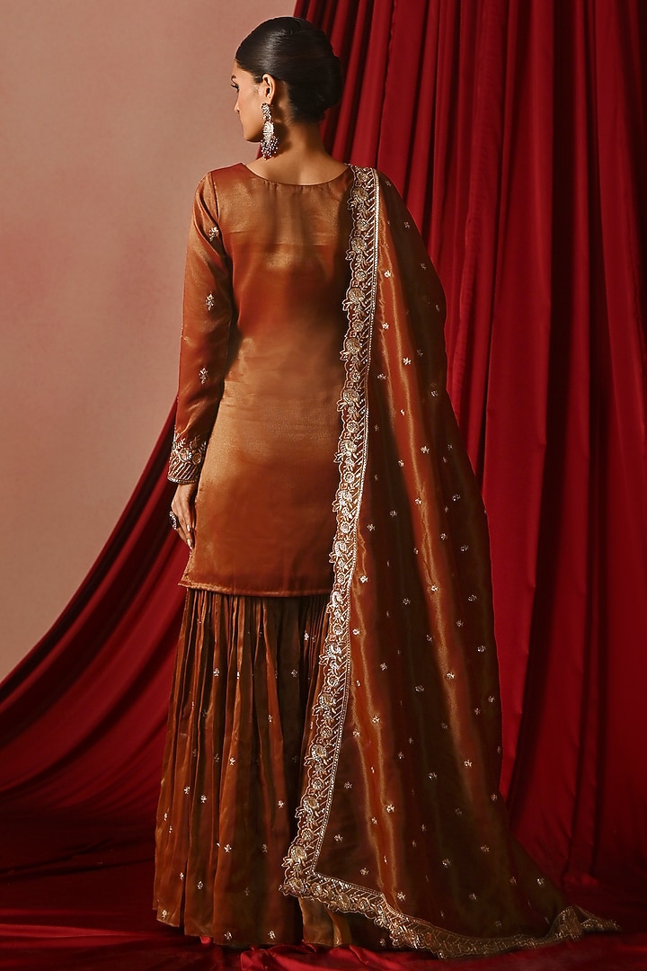 Dark Rust Tissue Gharara Set by Lashkaraa at Pernia's Pop Up Shop