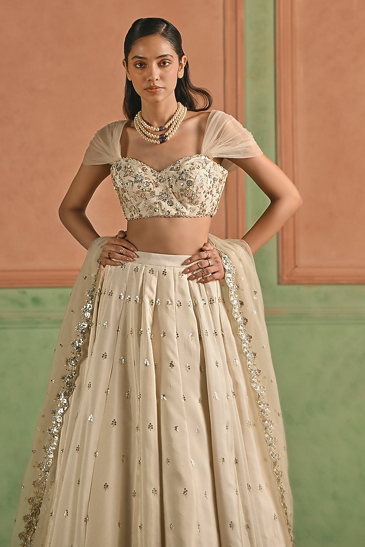 Cream Viscose Tissue Sequins Embellished Lehenga Set by Lashkaraa at Pernia's Pop Up Shop