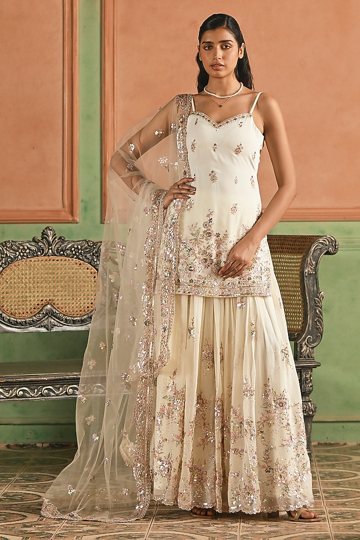 Off-White Georgette Sequins Embroidered Sharara Set by Lashkaraa at Pernia's Pop Up Shop