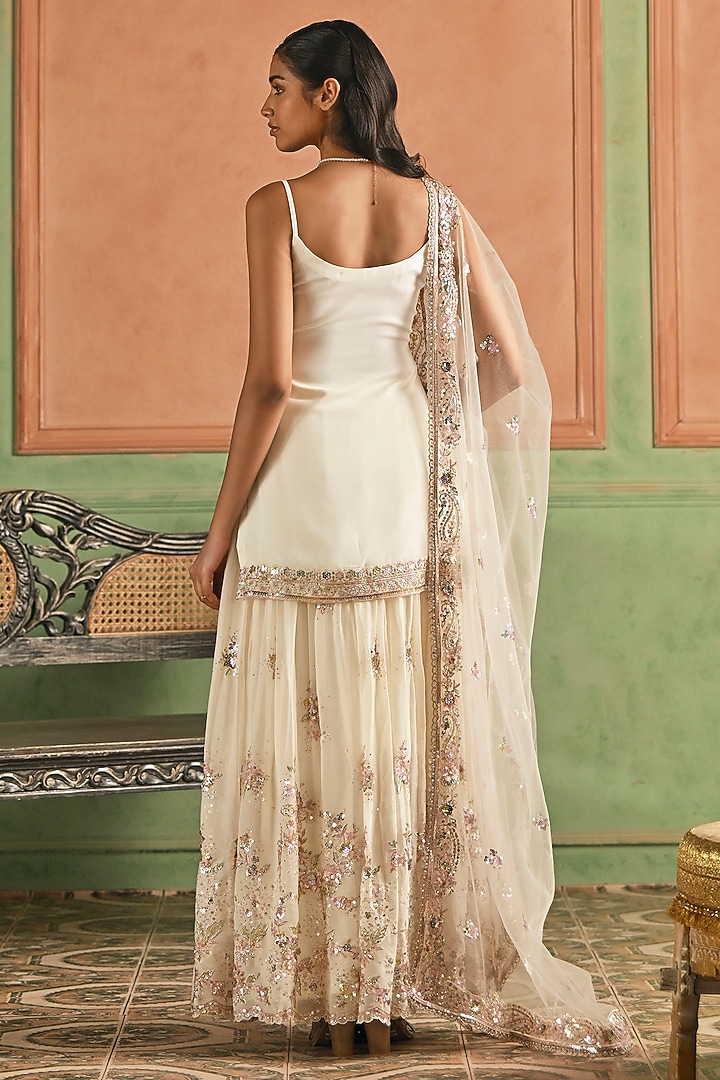 Off-White Georgette Sequins Embroidered Sharara Set by Lashkaraa at Pernia's Pop Up Shop