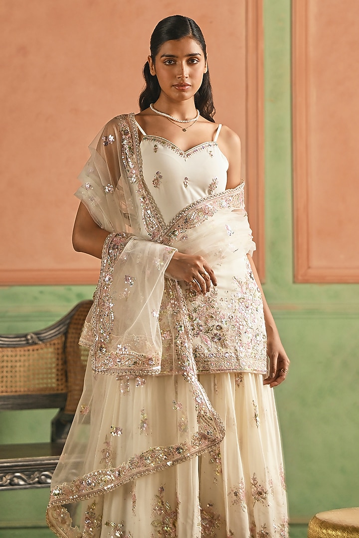 Off-White Georgette Sequins Embroidered Sharara Set by Lashkaraa at Pernia's Pop Up Shop