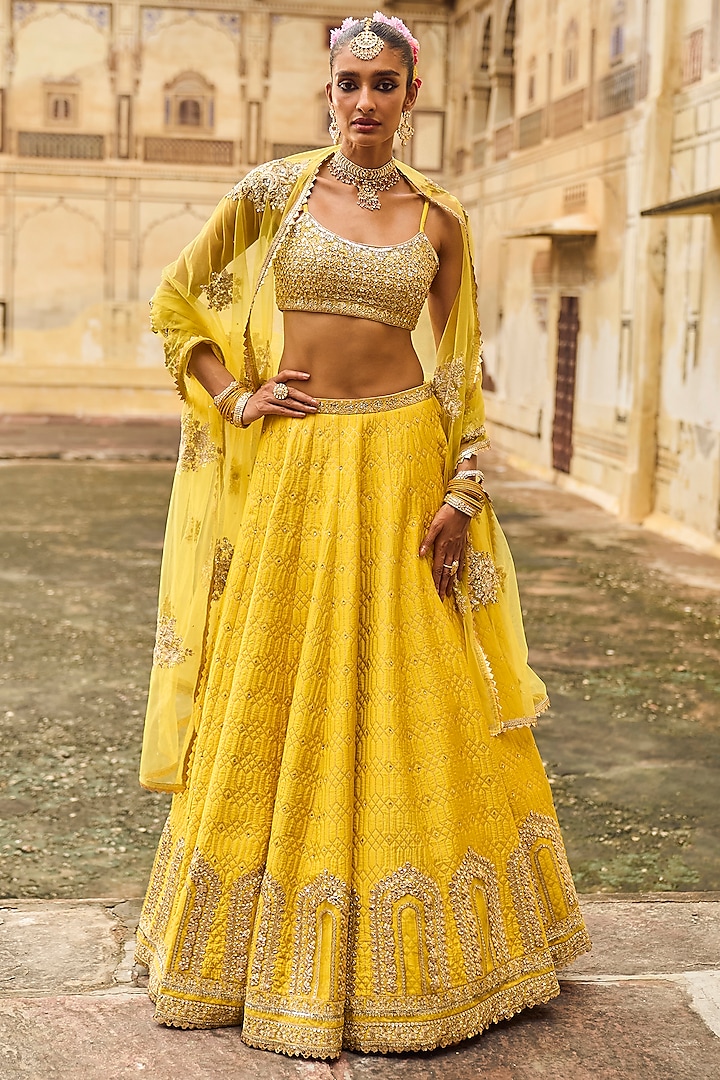 Yellow Brocade & Shantoon Thread Embroidered Lehenga Set by Lashkaraa