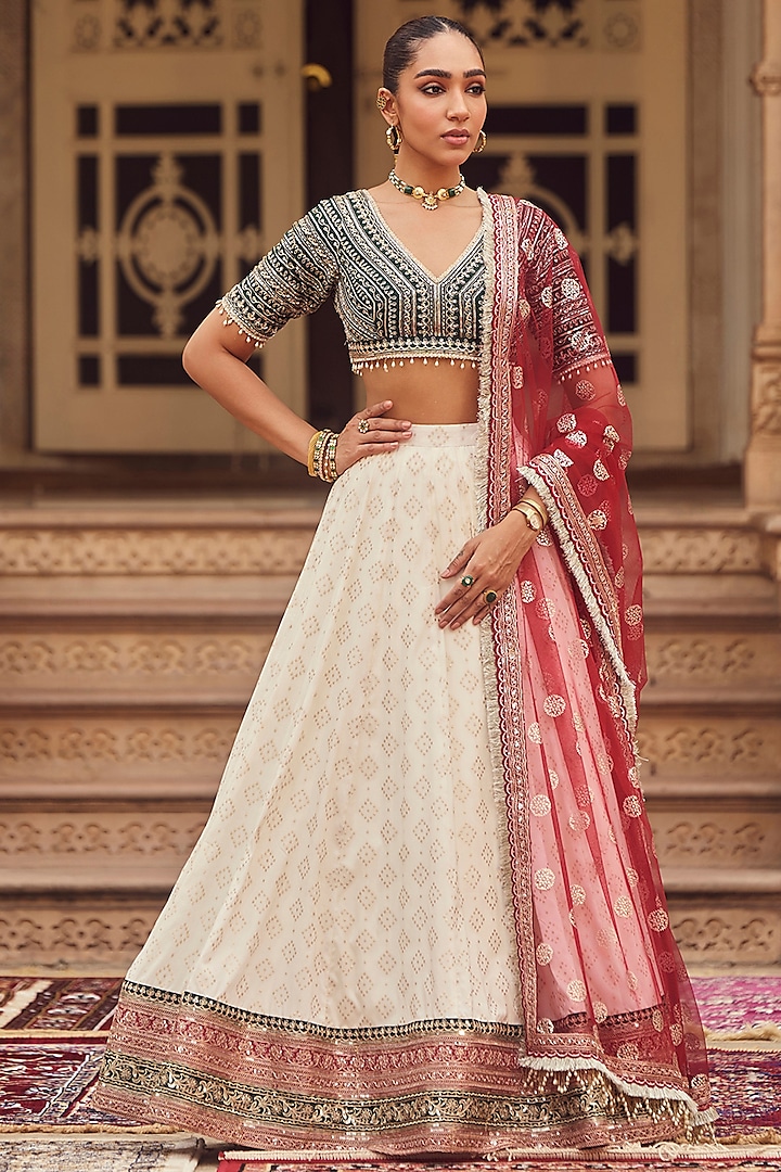 White Brocade Zari Hand Embellished Lehenga Set by Lashkaraa