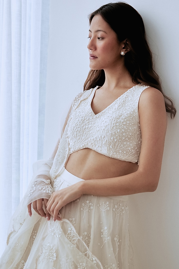 Ivory Organza Hand Embroidered Bridal Lehenga Set by Lavanya Ahuja at Pernia's Pop Up Shop