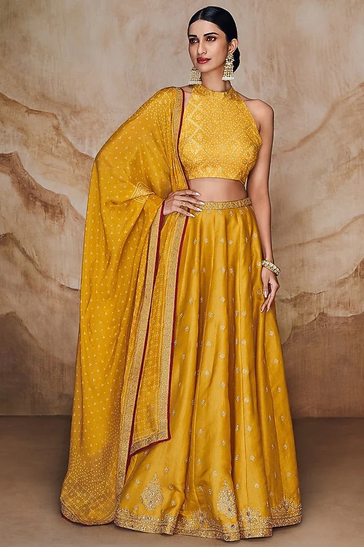 Yellow Art Tussar Silk Embroidered Lehenga Set by Label Varsha at Pernia's Pop Up Shop