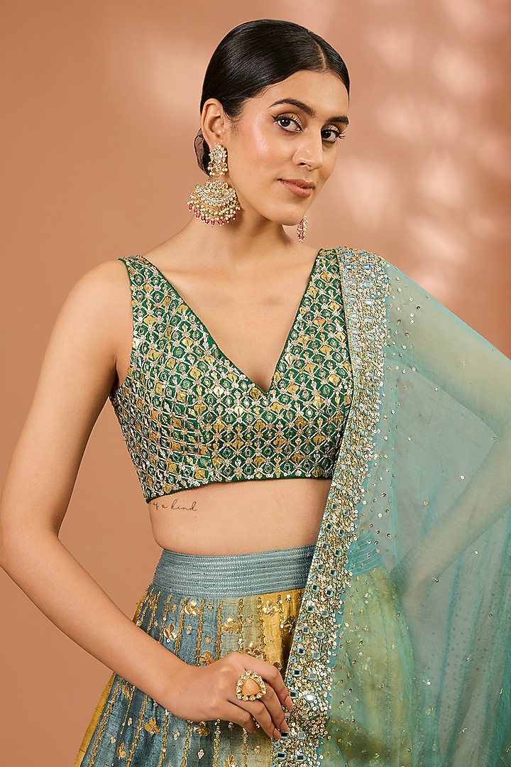 Green & Mustard Ombre Raw Silk Floral Hand Embroidered Bridal Lehenga Set by LOKA By Veerali Raveshia at Pernia's Pop Up Shop