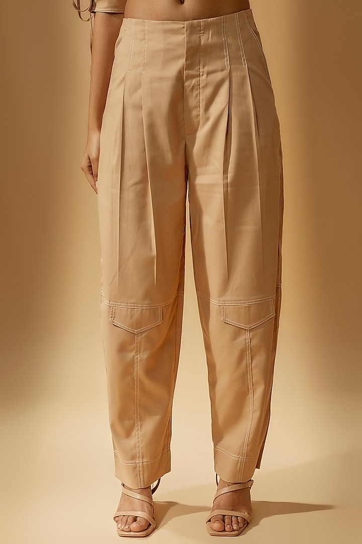 Beige Terry Rayon Pleated Trousers by Lovebirds