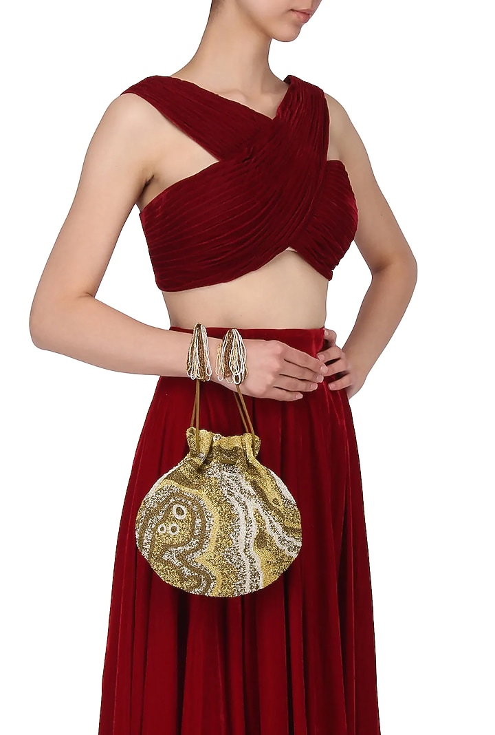 Matte gold and silver pschyadelic design potli/pouch available only at Pernia's Pop Up Shop.