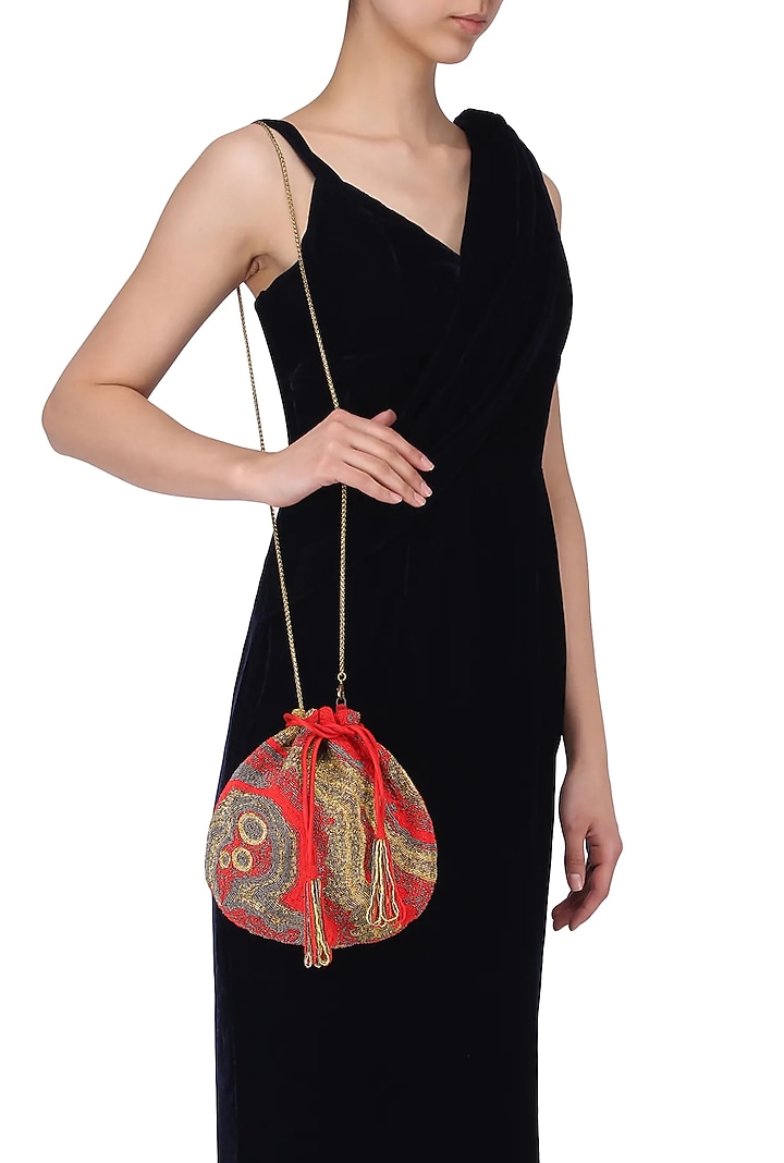 Red, gold and silver pschyadelic design potli/pouch available only at Pernia's Pop Up Shop.