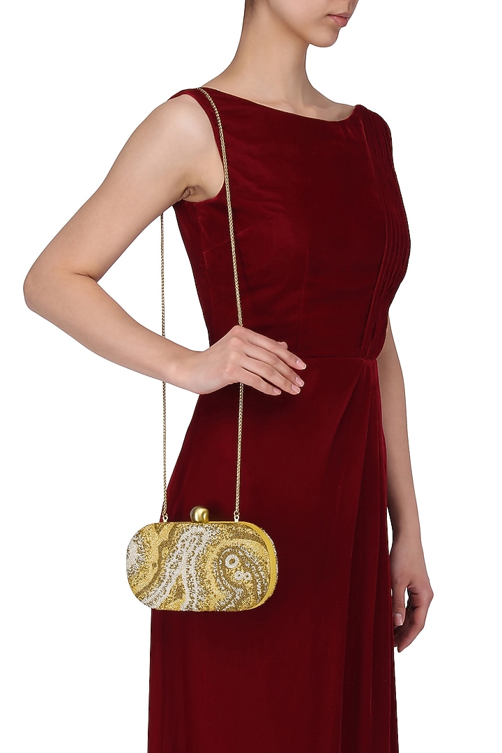 Matte gold and white timeless box clutch available only at Pernia's Pop Up Shop.